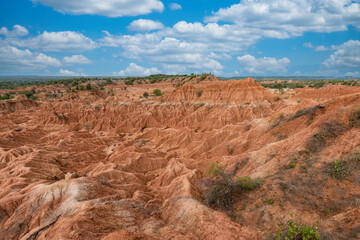 Natural landscape with geological formations and green Cactus in the Red Desert. Huila, Colombia.