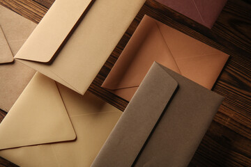 Creative layout of floating colored envelopes on wooden boards