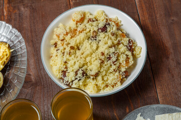 Couscous with dried fruits and nuts on the festive table