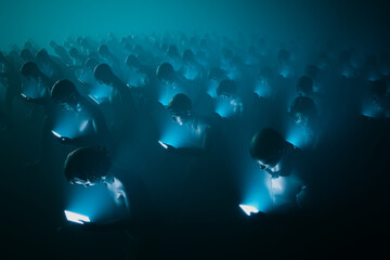Enthralled Crowd with Smartphones in a Monochromatic Blue Hue