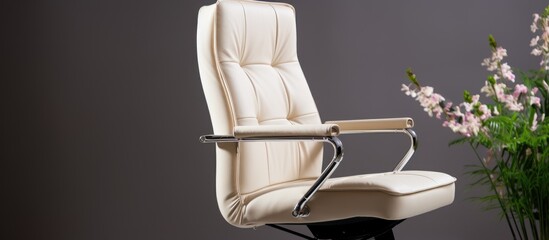 Modern office chair made of beige leather