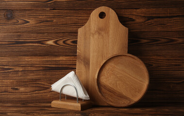 Set of wooden eco kitchen utensils on boards.