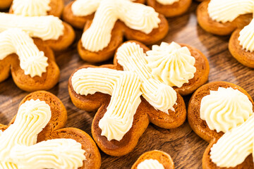 Making Festive Gingerbread Sandwiches on Rustic Wooden Table