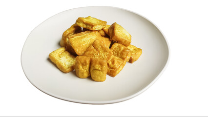 Fried tofu on a plate isolated on white background, yellow tofu or takwa tofu on a dining plate. 