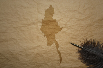 map of myanmar on a old paper background with old pen