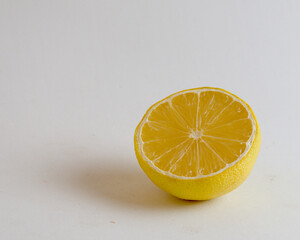 half lemon on white background