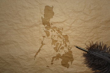 map of philippines on a old paper background with old pen