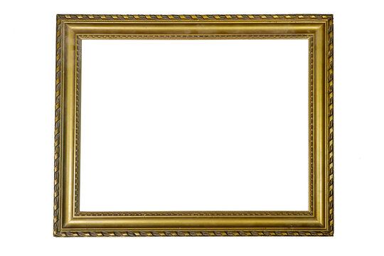 Empty gold ornate picture frame with white background