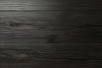 close up of the surface of a black dark flooring wood wall wooden plank board texture background with structures and grains