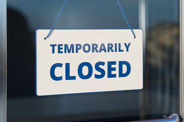 Notice of Temporary Closure on Business Establishment's Glass Door