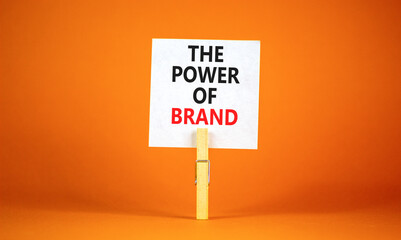The power of brand symbol. Concept words The power of brand on beautiful white paper on clothespin....