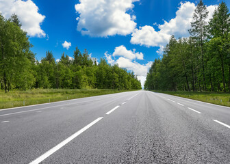 Fototapeta na wymiar abstract empty road in summer, blue sky, white clouds, highway or speedway in rural countryside created with generative ai technology