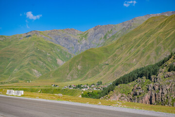 The Serene Heights: Green Mountains and a Sea of Blue