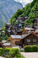 Wooden houses in historic village Hallstatt in Austrian Alps.