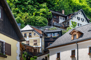 Fototapeta na wymiar Wooden houses in historic village Hallstatt in Austrian Alps.