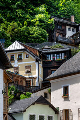 Wooden houses in historic village Hallstatt in Austrian Alps.