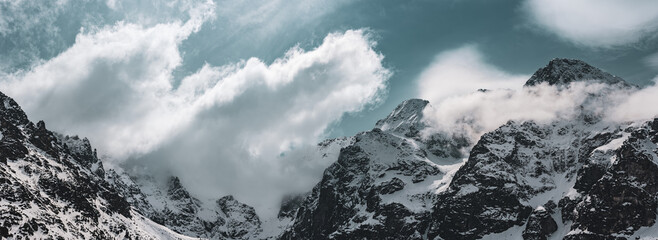 Mountain peaks near Morskie Oko or Sea Eye Lake in Poland at Winter. Tatras range - 753249777