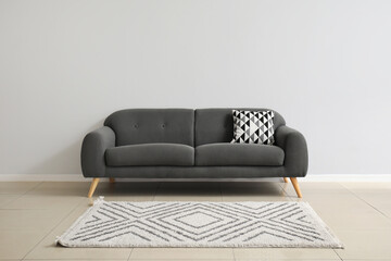 Interior in minimalism style with sofa and pillow