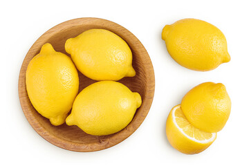 Ripe lemons in wooden bowl isolated on white background. Top view. Flat lay.