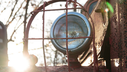 searchlight on a fire truck close-up with sun glare