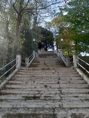 Fototapeta na wymiar Escaleras de acceso a la iglesia de A Ponte de Outeiro, Galicia