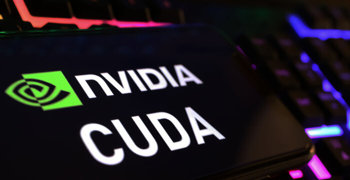 Viersen, Germany - March 1. 2024: Closeup of smartphone screen with logo lettering of Nvidia Cuda on computer keyboard