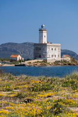 Fototapeta na wymiar Leuchtturm Isola della Bocca, Olbia, Sardinien, Italien