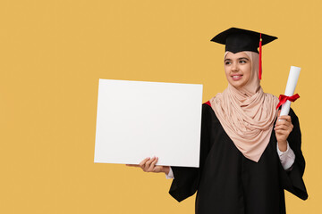 Happy Muslim female graduating student with diploma and blank poster on yellow background