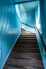 Fototapeta premium wooden staircase in an old homestead house
