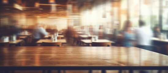 Abstract blurred background in cafe restaurant with wooden table and customer
