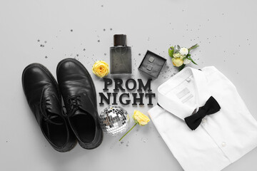 Words PROM NIGHT with male shoes, shirt and perfume bottle on white background