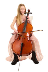 Young girl in elegant pink dress playing cello
