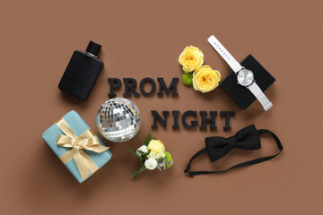 Words PROM NIGHT with bow tie, gift box and perfume bottle on brown background