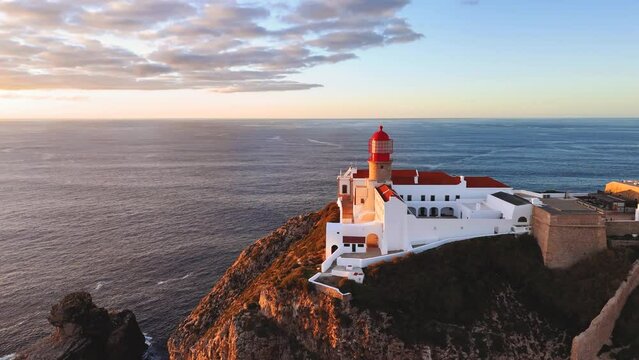 Flying over the lighthouse on Cabo de Sao Vicente at sunset, Portugal
