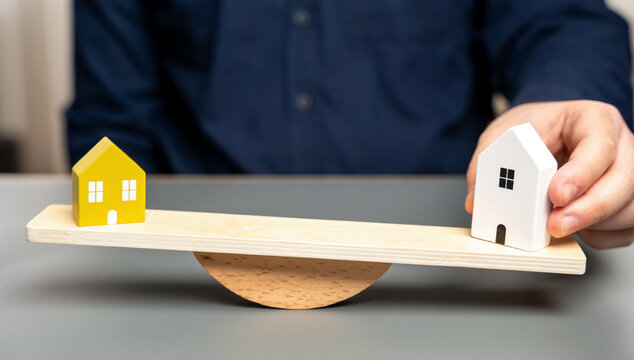 Comparison of houses. Total cost of ownership, including potential renovations and ongoing maintenance. Comparing key features like size, location, condition, and price. Compare houses.