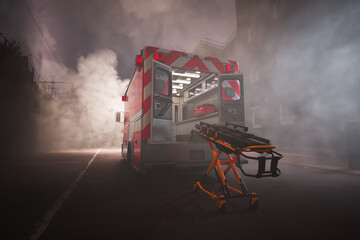 Rapid Emergency Services Response on a Foggy Urban Street at Night