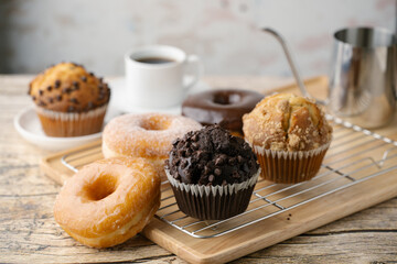 glazed donuts with coffee and muffins