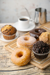 glazed donuts with coffee and muffins