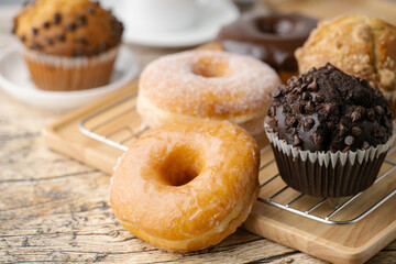 glazed donuts with coffee and muffins - obrazy, fototapety, plakaty