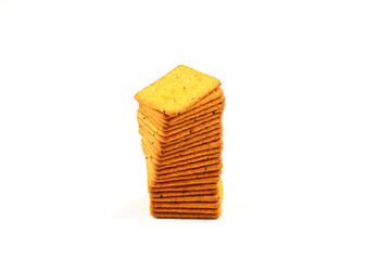 Pile of crackers with different seeds isolated on white background.