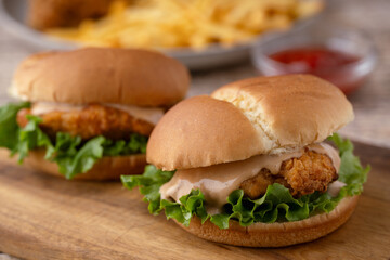 fried chicken sandwich with french fries