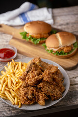 fried chicken, chicken sandwich and fries
