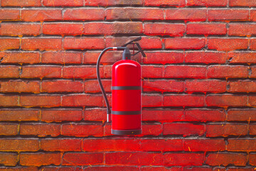 Emergency Fire Extinguisher Mounted on Textured Brick Wall Facade