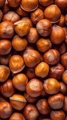 Obraz premium Whole Hazelnuts Close-Up - Nutritious Snack Background Wallpaper