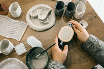 Master makes creative products from plaster and concrete, process