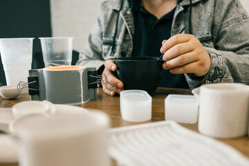 Master makes creative products from plaster and concrete, process