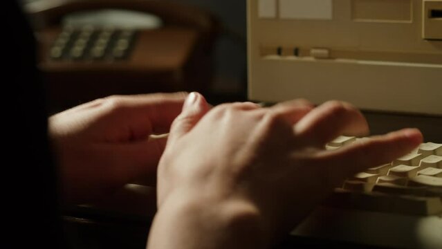 Woman writing on keyboard retro pc close-up , Old computer studio close-up, Desktop vintage retro wave display, late 90s PC.
