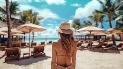 Cercles muraux Bora Bora, Polynésie française woman at a luxury eco-friendly resort, wearing beachwear and summer hat beach umbrellas, and lounge chairs in the background, luxury vacation Bora Bora