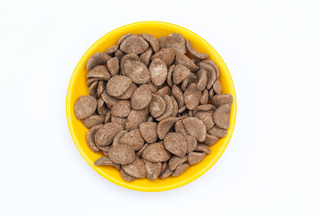 Chocos in a bowl on white background top view 