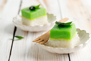 Two Layered Dessert with Steamed Glutinous Rice at the Bottom and Green Custard Layer Cake